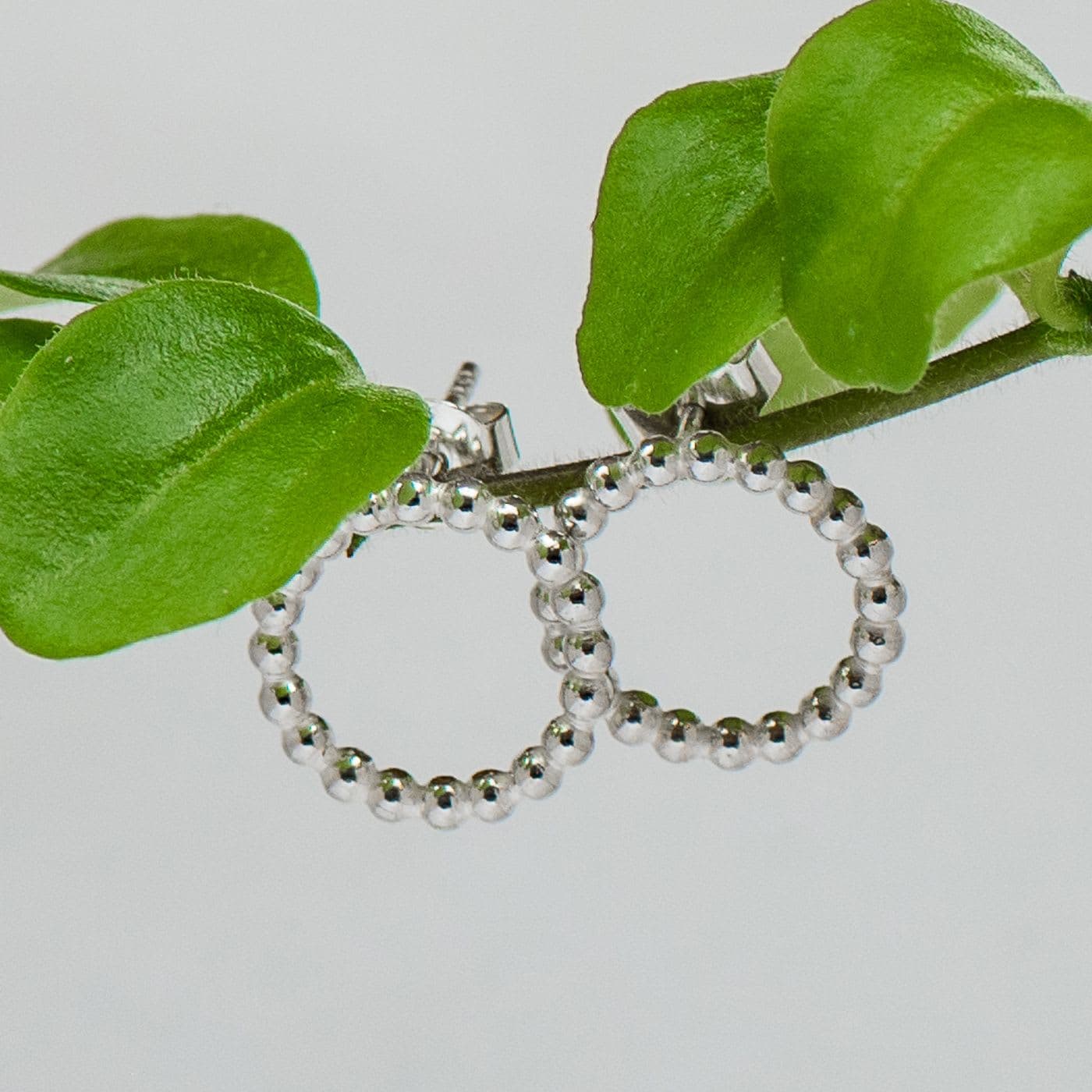 Cirkel oorbellen met pareldraad